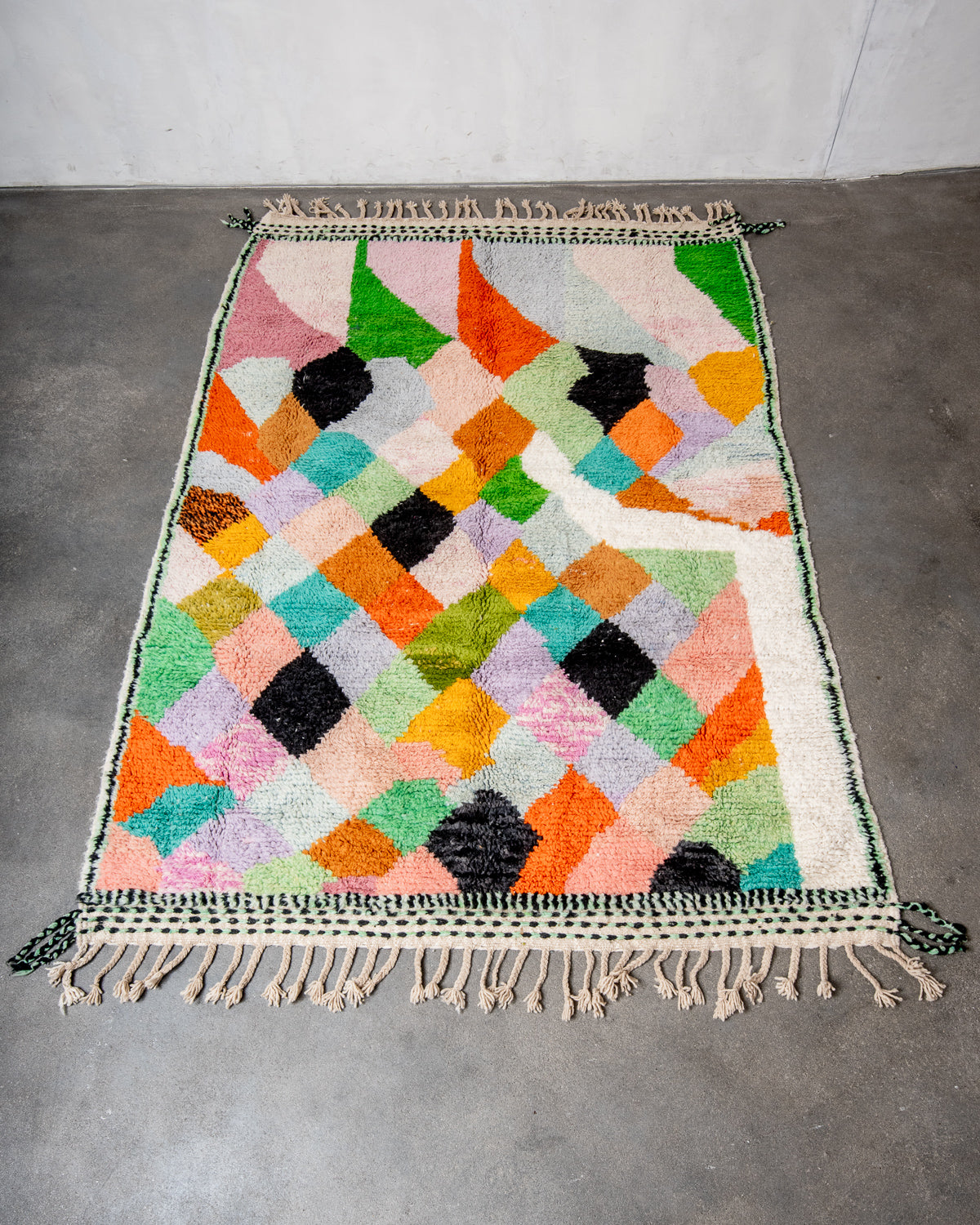 Modern, designer, handcrafted Berber rug from Morocco. Beniourain carpet with beautiful colours and patterns and fluffy wool texture.